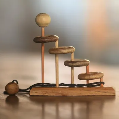 Alternate image for Artisan Crafted Teak Wood Desktop Puzzle Game from Java Magic Knot